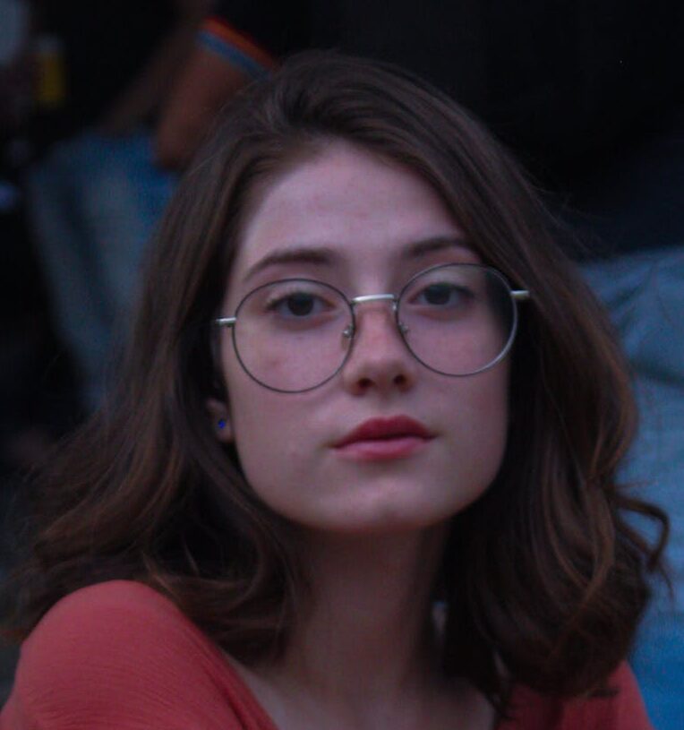 Photo of Girl Wearing Eyeglasses